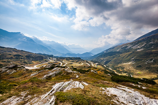 beautiful mountainscape with serpentine road of san bernardino pass, switzerland.