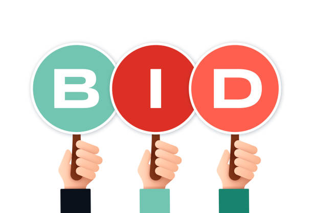 Auction Bidders Hands holding up auction bidding paddles. e auction stock illustrations