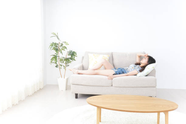 istock Young Japanese woman at home 871648056