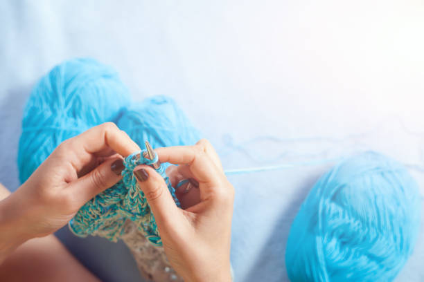 istock Close-up woman  knitting 871652598