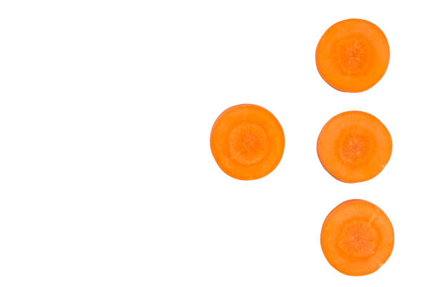 istock carrot Slice isolated on white background 871656958