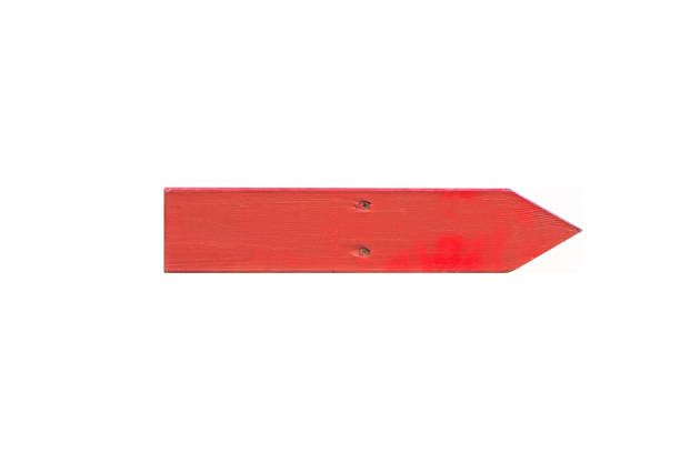 Isolated red wooden sign with two screws on white background.