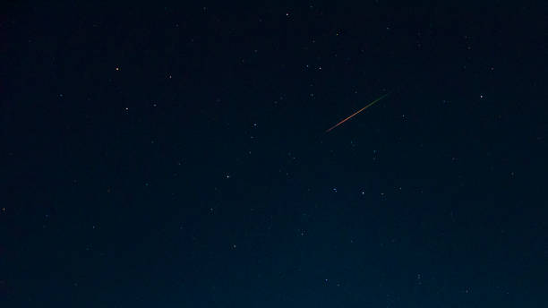 istock Meteor in the starry sky 871661218
