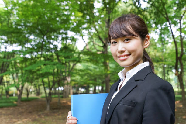 istock Young business woman walking outside 871672446