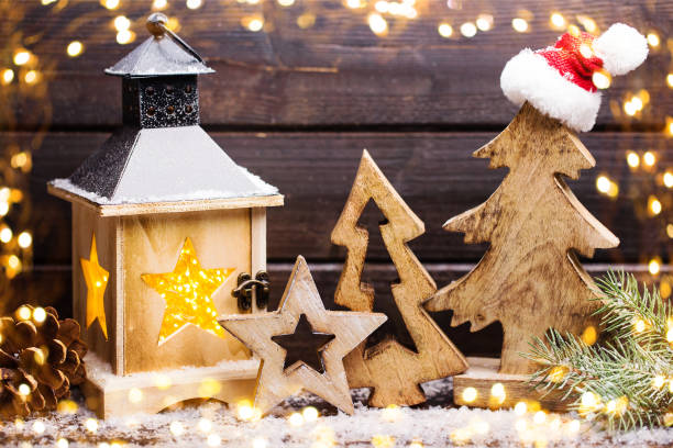 istock Burning lantern and christmas decoration in the evening. 871672764