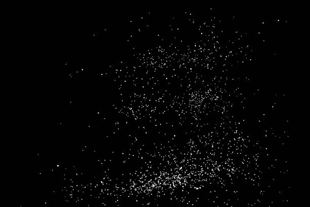 istock Abstract grainy texture isolated on black background. Top view. Dust, sand blow or bread crumbs. Silhouette of food flakes such as salt or almond or wheat flour spread on the flat surface or table. 871675844