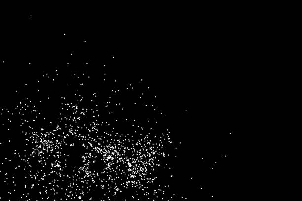 istock Abstract grainy texture isolated on black background. Top view. Dust, sand blow or bread crumbs. Silhouette of food flakes such as salt or almond or wheat flour spread on the flat surface or table. 871676458