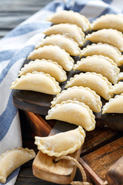 istock Pierogi with cottage cheese prepared for cooking. 871679124
