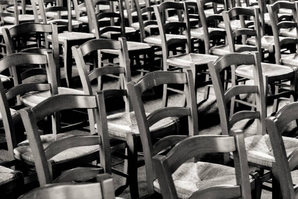 istock wooden chairs in a church 871679344