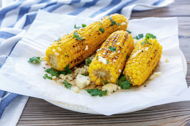 istock Sweet corn grilled with cheese and cilantro. 871682548