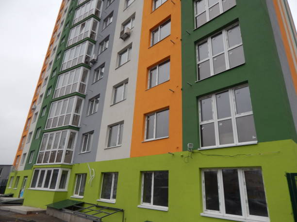 istock Construction of a multi-storey residential building, new building 871682978