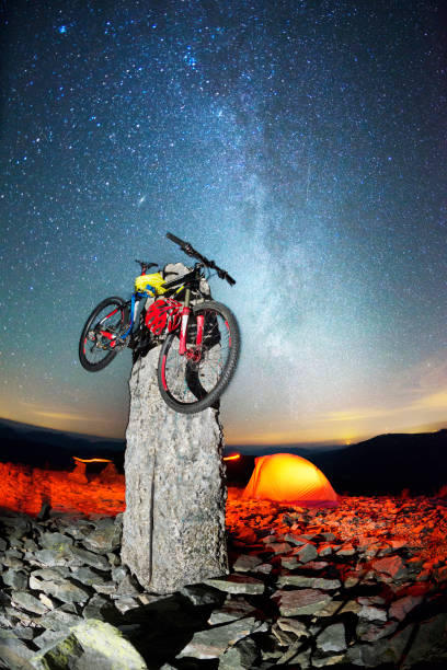 istock bike on a stone pillar tops at night 871686742