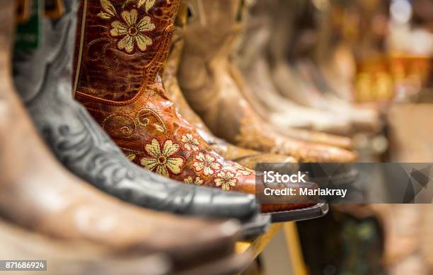 Closeup Of New Cowboy Boots On Shelf Stock Photo - Download Image Now - Store, Wild West, Shopping