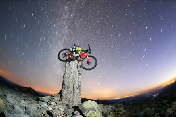 istock bike on a stone pillar tops at night 871687142