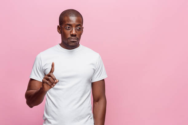 istock Positive thinking African-American man on pink background 871691970