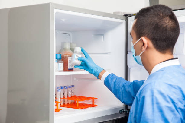 istock Male scientist and laboratory freezer 871706500