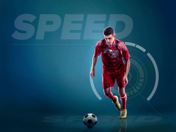 istock Soccer player in action with ball 871706804