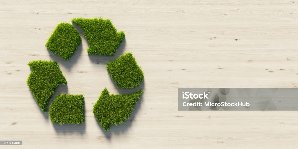 Recycling Symbol Made Of Green Grass : Green Energy Concept Recycling symbol made of green grass on wood background. Horizontal composition with copy space. Green energy concept. Recycling Stock Photo