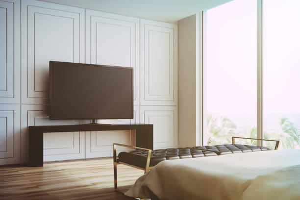 istock White living room, TV set side view toned 871717452
