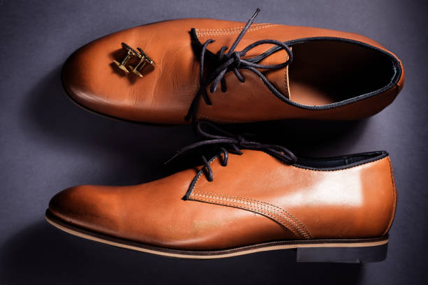 istock brown male shoes and cuff 871718596