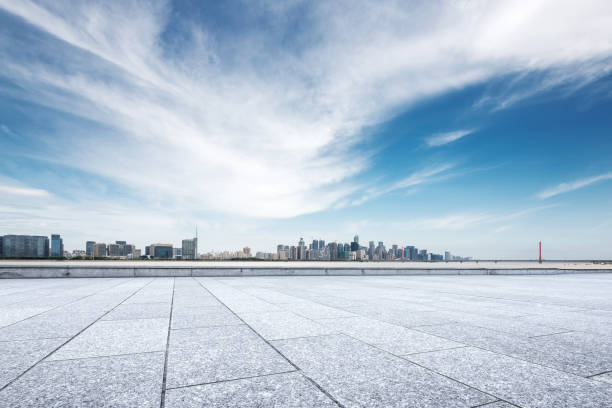istock empty marble floor with modern bridge and buildings 871719016