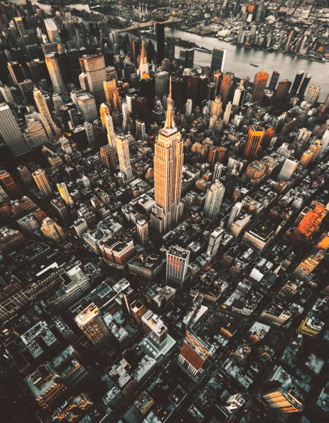 istock empire state building aerial view at dusk 871719384