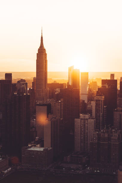 istock empire state building aerial view at dusk 871720130
