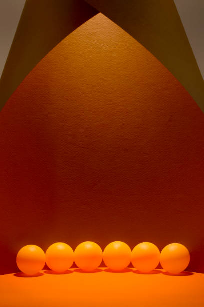 Abstract still life with orange balls on a colorful background
