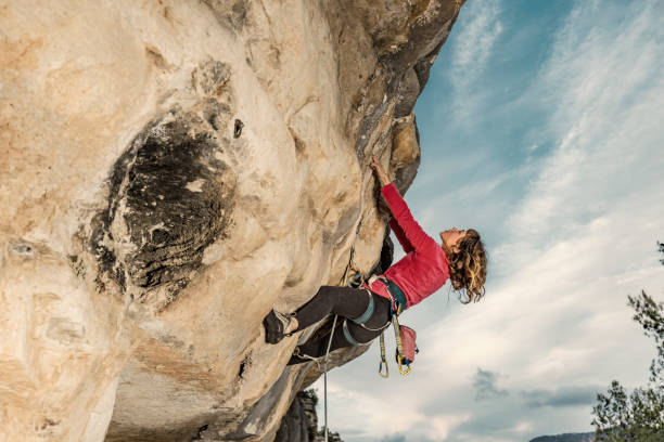 istock Woman practicing rock climbing in Siurana Catalonia 871734544
