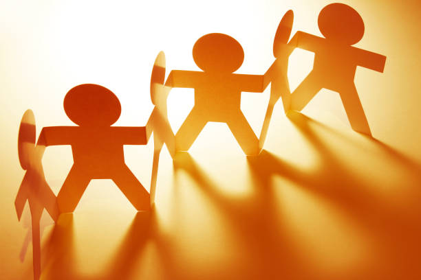 istock Paper chain team united 871738552