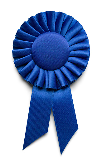 Blue Fabric Award Ribbon with Copy Space Isolated on White Background.