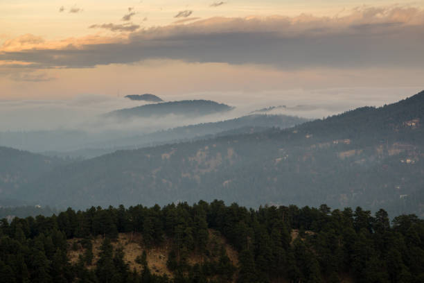 istock Foggy Sunset - Evergreen, Colorado 871745946