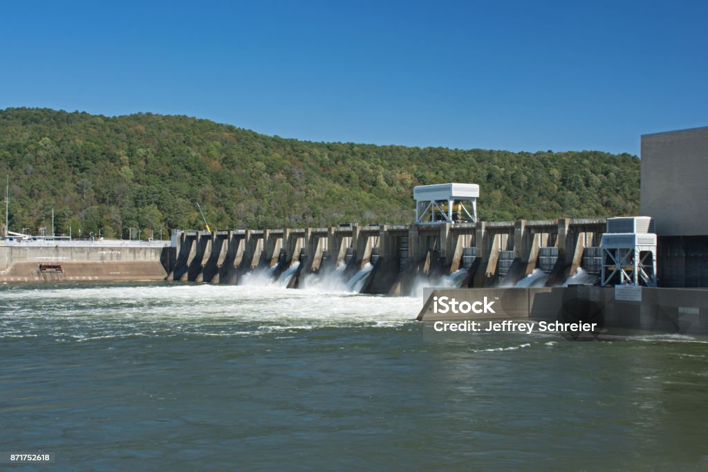Guntersville Dam Water flowing over hydroelectric dam. Dam Stock Photo
