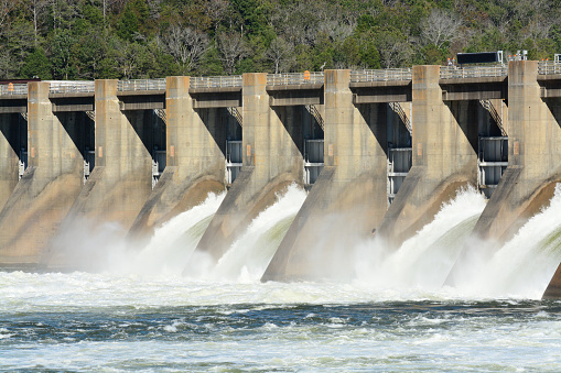 Water flowing over dam.
