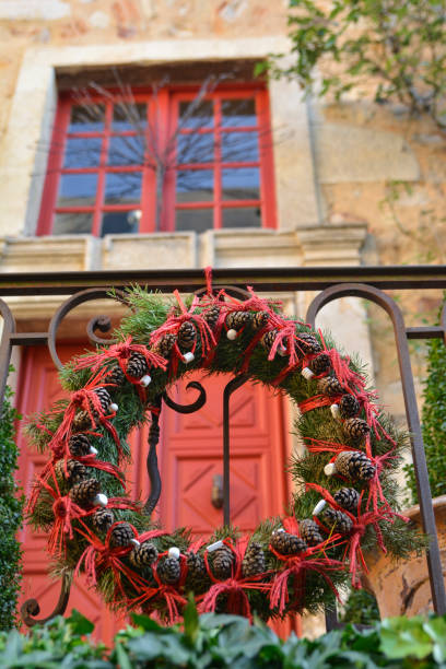 istock wreath of Christmas tree branches and cones 871752740