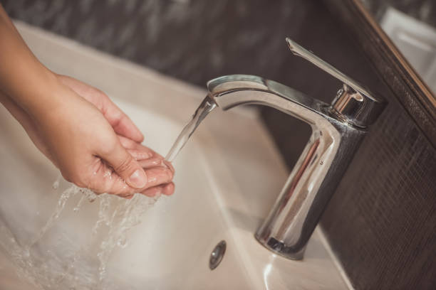 istock Woman in bathroom 871753890