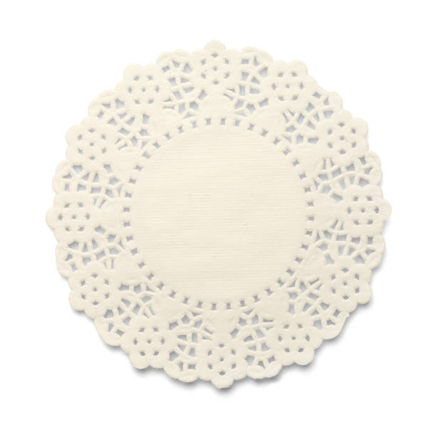 Doily White Paper Doily With Lace Pattern Isolated on White Background. doily stock pictures, royalty-free photos & images