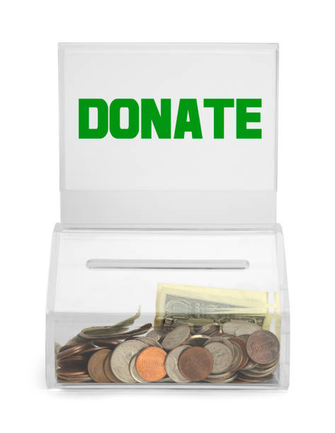 Donate Box Clear Plastic Donation Box With Money Isolated on White Background. transparent donation box stock pictures, royalty-free photos & images