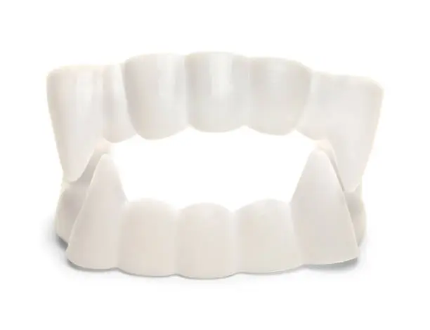 White Plastic Vampire Teeth Isolated on White background,
