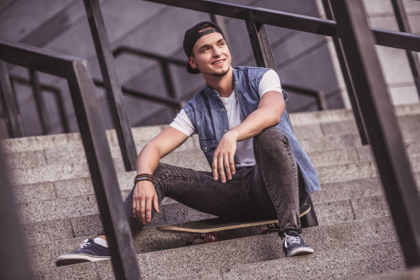 istock Stylish guy in city 871756890