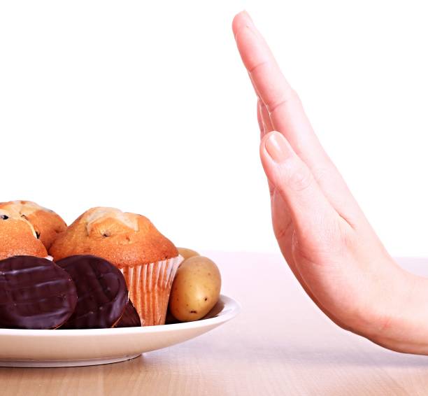 istock new year's resolutions unhealthy food 871757074