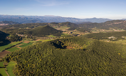 Vista aérea del Parque Natural de zona volcánica Garrotxa y Santa Margarida Volcano en primer plano photo