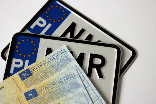 Polish driving license, car documents, car keys, license plates