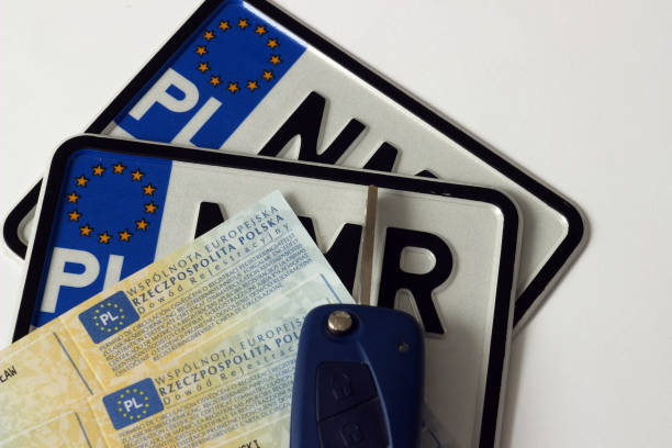 istock Polish driver's license, license plates, car documents (registration certificate) and car keys 871763318