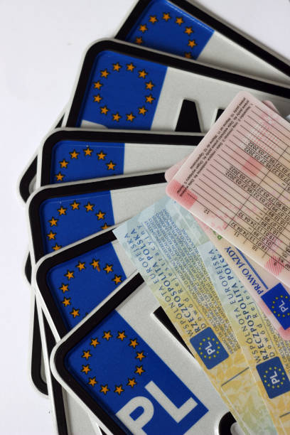 istock Polish driver's license, license plates, car documents (registration certificate) and car keys 871763900