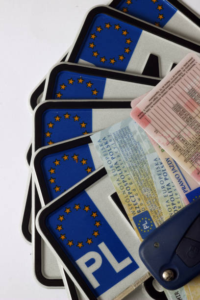 istock Polish driver's license, license plates, car documents (registration certificate) and car keys 871763966