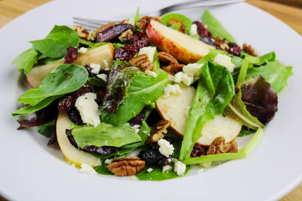 осенний салат - cranberry salad стоковые фото и изображения
