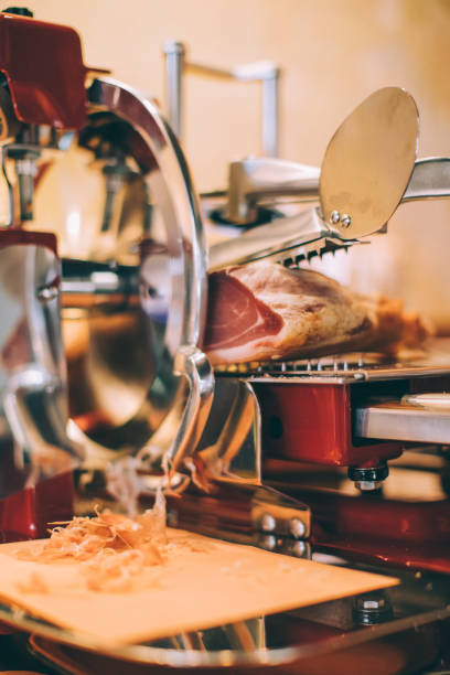 istock Meat slicer with prosciutto 871770960