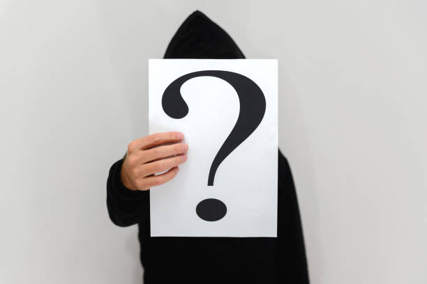 istock man with an inscription with a question mark 871774116