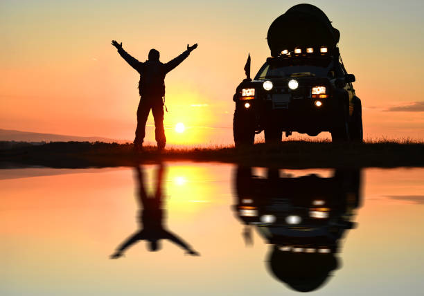 sunrise and the happiness of traveling by car stock photo